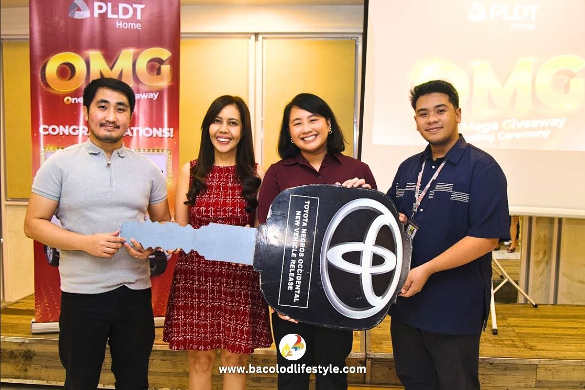 PLDT Home One Mega Giveaway grand winner Andrea with PLDT and Toyota executives